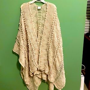 Beautiful crocheted, Sonoma,1-size-fits-all shawl,cream color. Goes to mid calf.